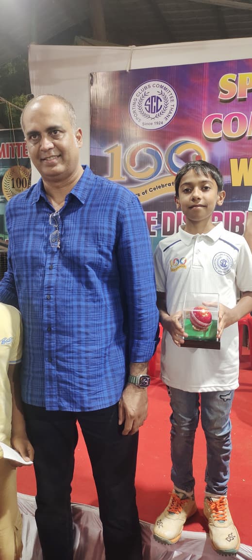 Best bowler trophy to MK Student by Indian spiner Nilesh kulkarni